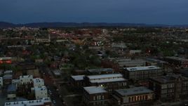5.7K aerial stock footage of a hospital seen from downtown at twilight, Albuquerque, New Mexico Aerial Stock Footage | DX0002_128_014