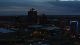 5.7K aerial stock footage orbit office high-rise, hotel and Kiva Auditorium at twilight, Downtown Albuquerque, New Mexico Aerial Stock Footage | DX0002_128_026