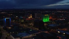 5.7K aerial stock footage flyby hotel and office buildings, approach Wells Fargo Building at twilight, Downtown Albuquerque, New Mexico Aerial Stock Footage | DX0002_128_037
