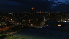 5.7K aerial stock footage of office high-rise, hotel and auditorium at twilight, Downtown Albuquerque, New Mexico Aerial Stock Footage | DX0002_128_046