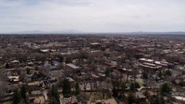 5.7K aerial stock footage flying by the downtown area and surrounding city of Santa Fe, New Mexico Aerial Stock Footage | DX0002_129_023