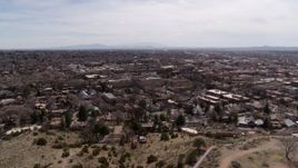 5.7K aerial stock footage wide view of the downtown area, surrounding city of Santa Fe, New Mexico during descent Aerial Stock Footage | DX0002_129_026