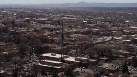 5.7K aerial stock footage passing Radio Plaza in the city's downtown area, Santa Fe, New Mexico Aerial Stock Footage | DX0002_129_032