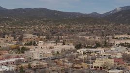5.7K aerial stock footage of flying by Bataan Memorial Building in the city's downtown area, Santa Fe, New Mexico Aerial Stock Footage | DX0002_129_038