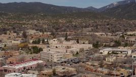 5.7K aerial stock footage fly away from Bataan Memorial Building near capitol building, Santa Fe, New Mexico Aerial Stock Footage | DX0002_129_041