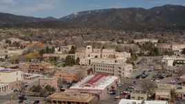 5.7K aerial stock footage fly away from Bataan Memorial Building near capitol, Santa Fe, New Mexico Aerial Stock Footage | DX0002_130_006