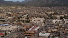 5.7K aerial stock footage descend and focus on Bataan Memorial Building near state capitol building, Santa Fe, New Mexico Aerial Stock Footage | DX0002_130_009