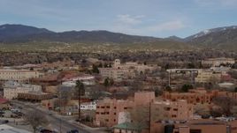 5.7K aerial stock footage of flying by shops and downtown buildings in Santa Fe, New Mexico Aerial Stock Footage | DX0002_130_012