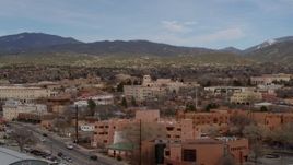5.7K aerial stock footage flyby shops and downtown buildings, focus on Bataan Memorial Building in Santa Fe, New Mexico Aerial Stock Footage | DX0002_130_013