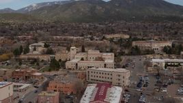 5.7K aerial stock footage ascend while focused on Bataan Memorial Building near the state capitol in Santa Fe, New Mexico Aerial Stock Footage | DX0002_130_015