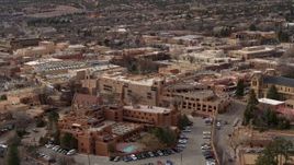 5.7K aerial stock footage flyby hotels to reveal a cathedral in Santa Fe, New Mexico Aerial Stock Footage | DX0002_130_033
