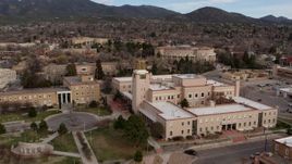 5.7K aerial stock footage approach the Bataan Memorial Building, capitol in background in Santa Fe, New Mexico Aerial Stock Footage | DX0002_131_006