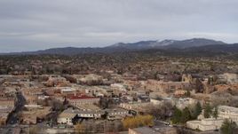 5.7K aerial stock footage flyby and away from the downtown area of Santa Fe, New Mexico, reveal Bataan Memorial Building Aerial Stock Footage | DX0002_131_010