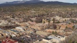 5.7K aerial stock footage reverse view of cathedral and downtown, reveal Bataan Memorial Building, Santa Fe, New Mexico Aerial Stock Footage | DX0002_131_017