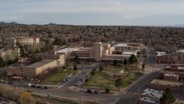 5.7K aerial stock footage orbit the Bataan Memorial Building before descending, Santa Fe, New Mexico Aerial Stock Footage | DX0002_131_034