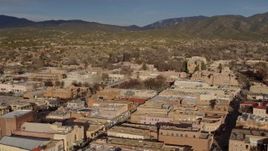 5.7K aerial stock footage flyby and away from downtown buildings around Santa Fe Plaza, Santa Fe, New Mexico Aerial Stock Footage | DX0002_132_003