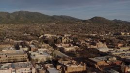 5.7K aerial stock footage of the cathedral seen while passing Santa Fe Plaza, Santa Fe, New Mexico Aerial Stock Footage | DX0002_132_012
