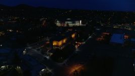 5.7K aerial stock footage view approach and orbit New Mexico State Capitol at night, Santa Fe, New Mexico Aerial Stock Footage | DX0002_132_021