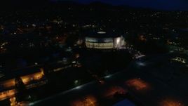 5.7K aerial stock footage of a reverse view of the New Mexico State Capitol at night, Santa Fe, New Mexico Aerial Stock Footage | DX0002_132_024