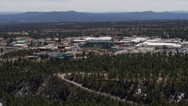 5.7K aerial stock footage wide view of the Los Alamos National Laboratory during descent, New Mexico Aerial Stock Footage | DX0002_133_028