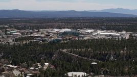 5.7K aerial stock footage wide stationary view and approach to the Los Alamos National Laboratory, New Mexico Aerial Stock Footage | DX0002_133_031
