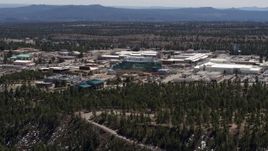 5.7K aerial stock footage of flying past the Los Alamos National Laboratory, New Mexico Aerial Stock Footage | DX0002_133_032