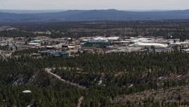 5.7K aerial stock footage of slowly flying away from the Los Alamos National Laboratory, New Mexico Aerial Stock Footage | DX0002_133_034