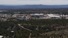 5.7K aerial stock footage of slowly flying by the Los Alamos National Laboratory complex, New Mexico Aerial Stock Footage | DX0002_133_035