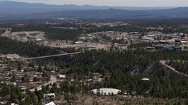5.7K aerial stock footage a bridge spanning the canyon to the Los Alamos National Laboratory complex, New Mexico Aerial Stock Footage | DX0002_133_039
