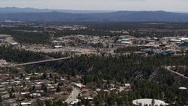 5.7K aerial stock footage of a bridge across a canyon and the Los Alamos National Laboratory, New Mexico Aerial Stock Footage | DX0002_133_042