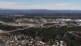 5.7K aerial stock footage slow approach to bridge across a canyon and the Los Alamos National Laboratory, New Mexico Aerial Stock Footage | DX0002_134_004