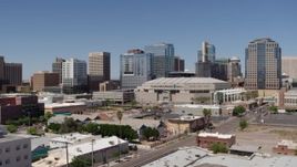 5.7K aerial stock footage of a view of the arena near office buildings in Downtown Phoenix, Arizona Aerial Stock Footage | DX0002_136_003