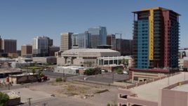 5.7K aerial stock footage of flying by the arena to reveal condo complex in Downtown Phoenix, Arizona Aerial Stock Footage | DX0002_136_005