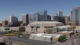 5.7K aerial stock footage of approaching the arena near office buildings in Downtown Phoenix, Arizona Aerial Stock Footage | DX0002_136_008