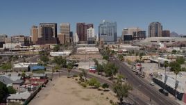 5.7K aerial stock footage of approaching tall office buildings seen from city streets, Downtown Phoenix, Arizona Aerial Stock Footage | DX0002_136_030