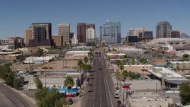 5.7K aerial stock footage flyby Central Avenue with a view of tall office buildings, Downtown Phoenix, Arizona Aerial Stock Footage | DX0002_136_031