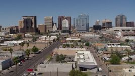 5.7K aerial stock footage passing Central Avenue with a view of high-rise office buildings, Downtown Phoenix, Arizona Aerial Stock Footage | DX0002_136_032