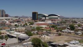 5.7K aerial stock footage of flying by condominium complex and baseball stadium, Downtown Phoenix, Arizona Aerial Stock Footage | DX0002_136_037