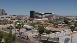 5.7K aerial stock footage of condominium complex and baseball stadium seen during decent, Downtown Phoenix, Arizona Aerial Stock Footage | DX0002_136_039
