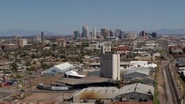 5.7K aerial stock footage of a wide view of the city's skyline, reveal grain elevator in Downtown Phoenix, Arizona Aerial Stock Footage | DX0002_136_048