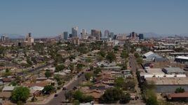 5.7K aerial stock footage of a view of the city's skyline in the distance, Downtown Phoenix, Arizona Aerial Stock Footage | DX0002_136_050
