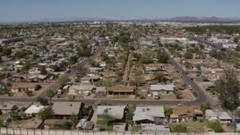 5.7K aerial stock footage orbiting urban homes in Phoenix, Arizona Aerial Stock Footage | DX0002_137_012