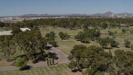 5.7K aerial stock footage of passing by a cemetery in Phoenix, Arizona Aerial Stock Footage | DX0002_137_017