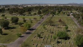 5.7K aerial stock footage flyby graves at a cemetery in Phoenix, Arizona Aerial Stock Footage | DX0002_137_024