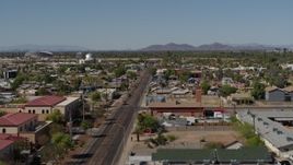 5.7K aerial stock footage flying by neighborhoods around 15th Avenue in Phoenix, Arizona Aerial Stock Footage | DX0002_137_044