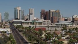 5.7K aerial stock footage of tall office buildings seen from Van Buren Street in Downtown Phoenix, Arizona Aerial Stock Footage | DX0002_137_049