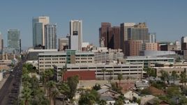 5.7K aerial stock footage of towering office buildings seen while flying near Van Buren Street in Downtown Phoenix, Arizona Aerial Stock Footage | DX0002_137_051