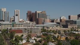 5.7K aerial stock footage of flying toward towering office buildings in Downtown Phoenix, Arizona Aerial Stock Footage | DX0002_137_054