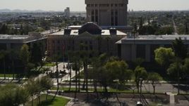 5.7K aerial stock footage of circling the front of Arizona State Capitol building in Phoenix, Arizona Aerial Stock Footage | DX0002_137_058
