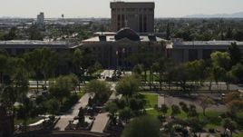 5.7K aerial stock footage a reverse view and orbit of the Arizona State Capitol building in Phoenix, Arizona Aerial Stock Footage | DX0002_137_065